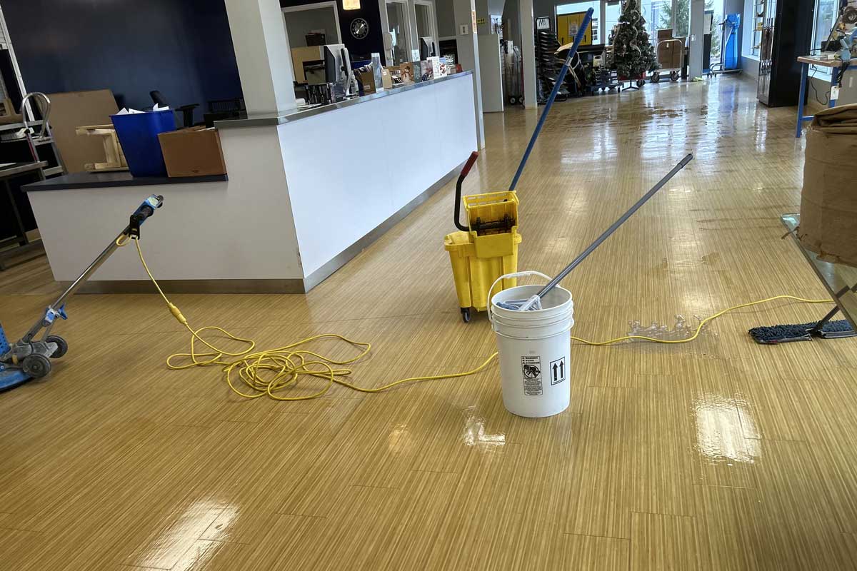 Easy Care Group commercial cleaning team sanitizing an office workspace in Halifax with eco-friendly janitorial services